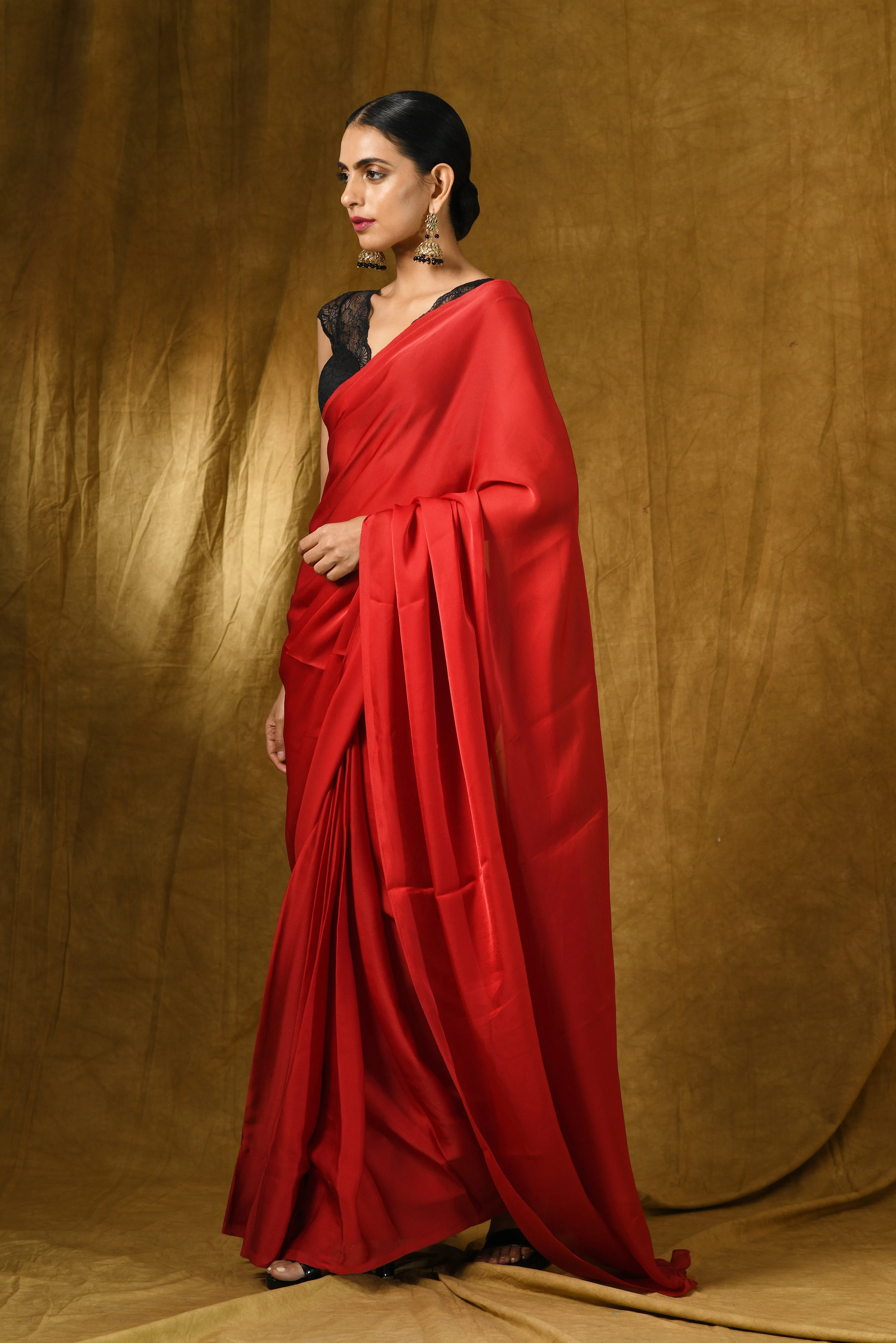 Fiery Red Satin Saree with Gold Pendants