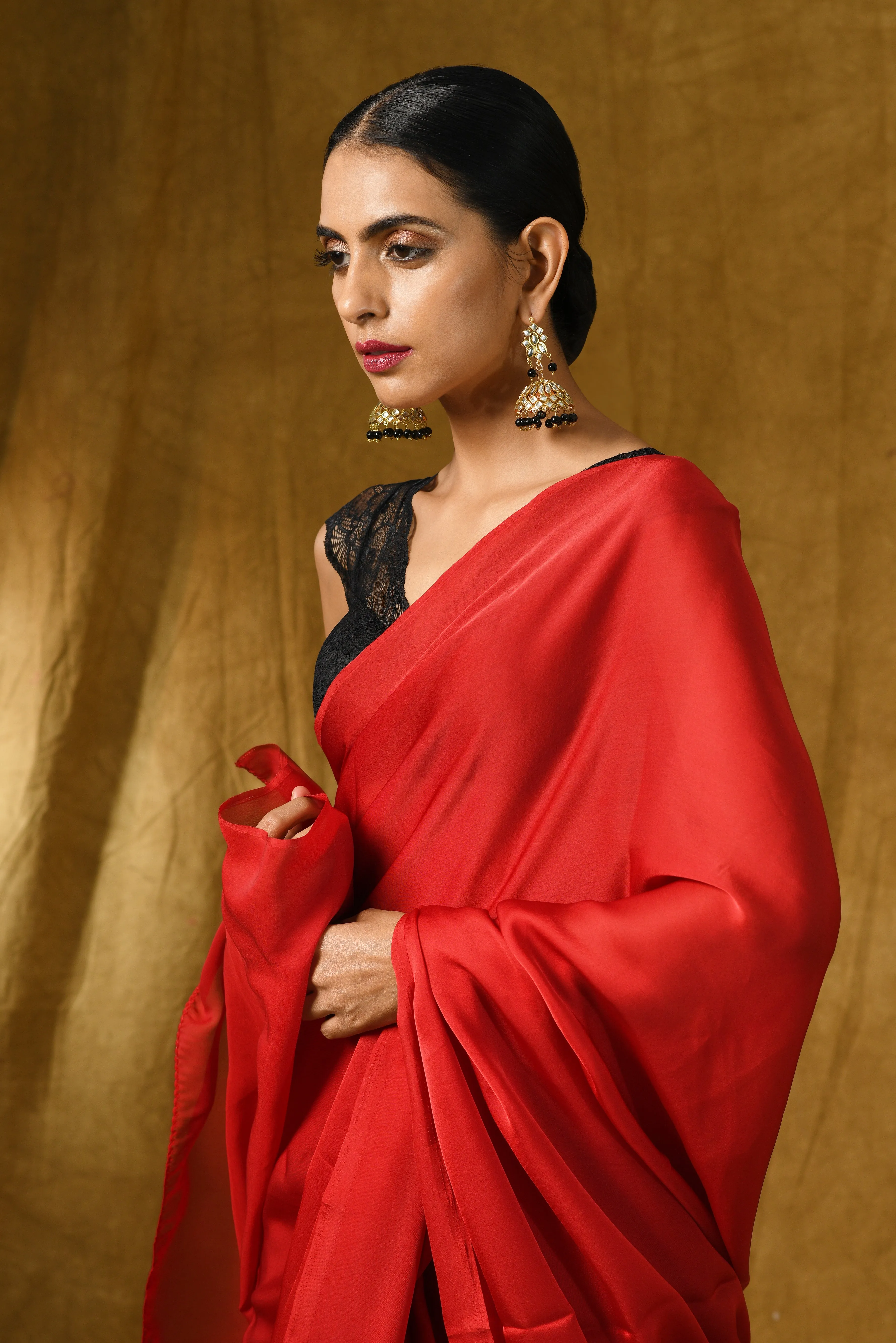 Fiery Red Satin Saree with Gold Pendants