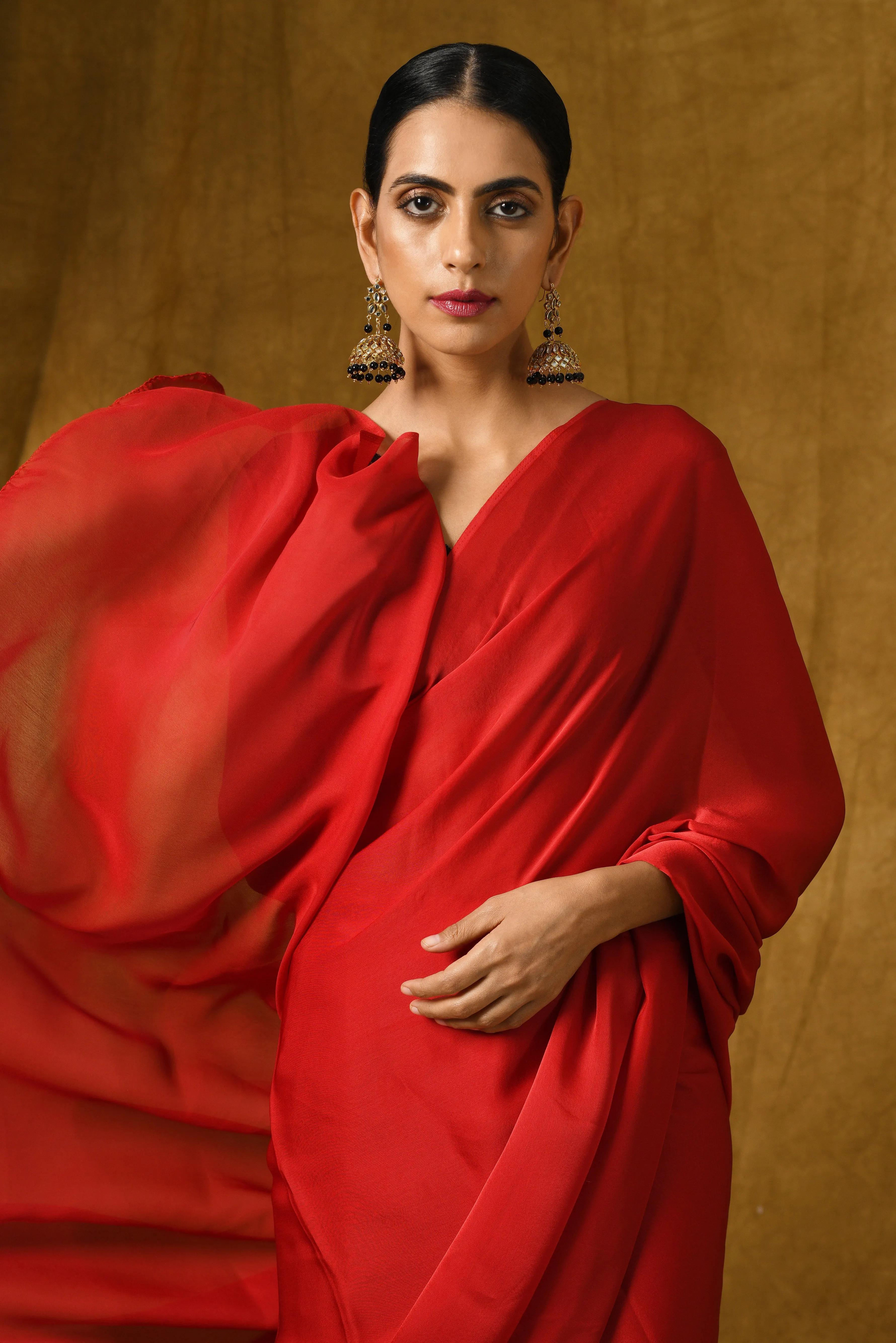 Fiery Red Satin Saree with Gold Pendants