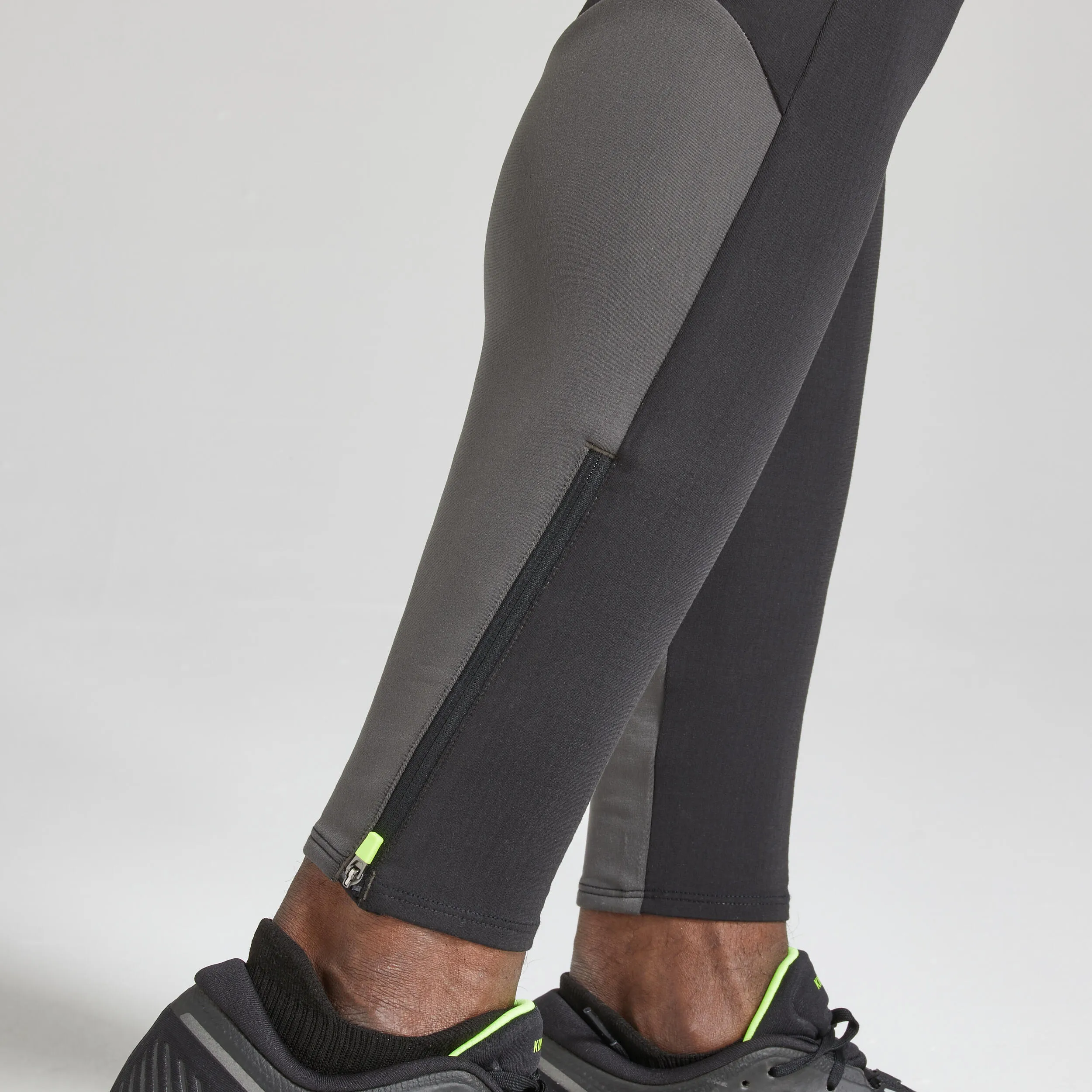 Men's Kiprun Warm long running pants black/gray black/charcoal/neon lime yellow